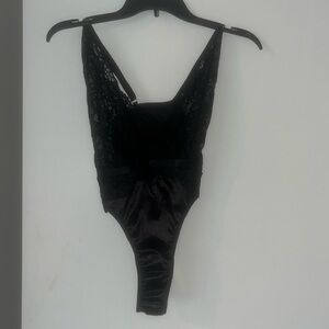Sexy and seductive Bodysuit by Arya.NWT